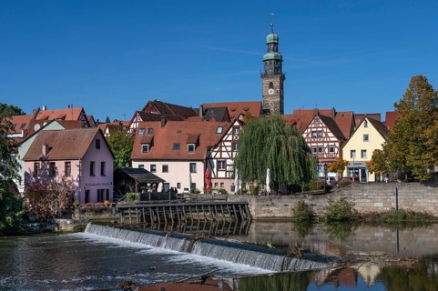 View of the old town with St. Johannis Church, in front the historic Schleifmühle and Pegnitz
