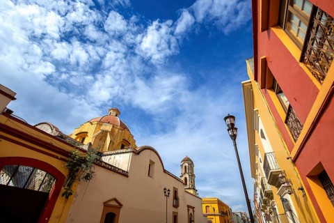 Oaxaca, Mexico, Scenic old city streets and colorful colonial buildings in historic city center