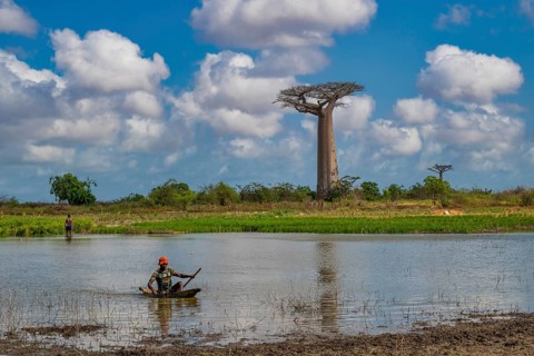 Boaters in a small lake on Baobab Alley in western Madagascar