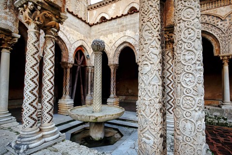 Famous Benedictine monastery cloister, decorated columns, double columns and fountains, Cathedral