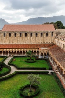 Famous Benedictine monastery cloister, courtyard garden, Norman architecture, Monreale Cathedral,
