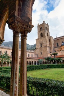 Famous cloister of the Benedictine monastery, decorated double columns, Cathedral of Monreale,
