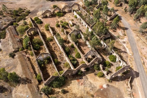 Ruins of former workshop halls, Mina de Sao Domingos, historic copper open-pit mine, aerial view,