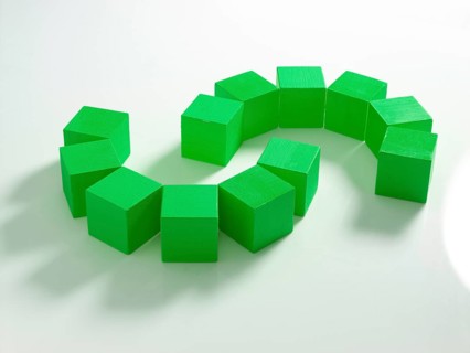 12 green wooden cubes against a white background
