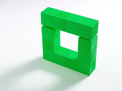 12 green wooden cubes against a white background