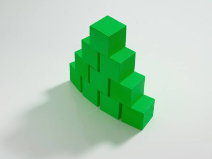 10 green wooden cubes against a white background