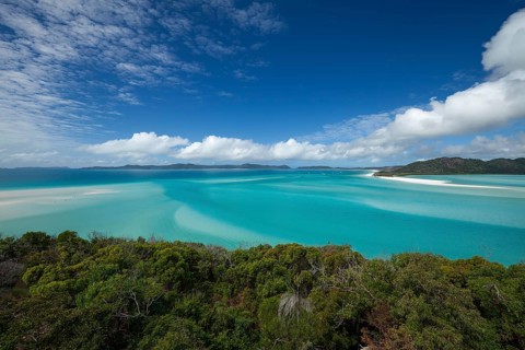 Sunny daytime view from Hill Inlet lookout over Whitehaven Beach, Whitsunday Island, Queensland,