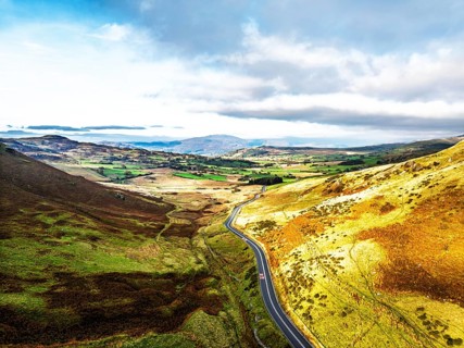Autumn colours over Mach Loop from a drone, Minffordd, Tywyn, Wales, UK