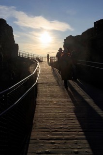 Walkers, tourists on hiking trail, Þingvellir National Park, impressive Almannagja Gorge,