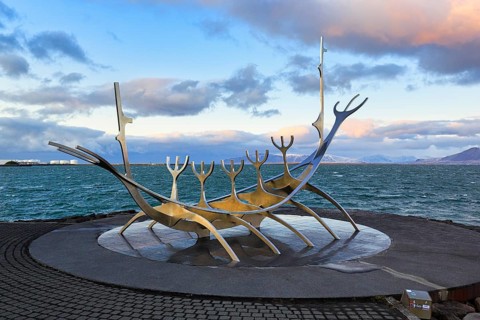 Sólfar sculpture, Solfar, sunrise, steel Viking ship by Jón Gunnar Árnason, evening with a view of