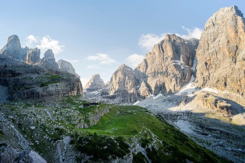 Picturesque mountain landscape in the morning, Rifugio Ai Brentei mountain hut and Cima Tosa rock
