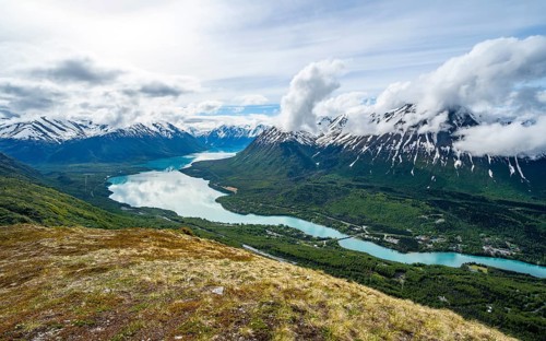View of snowy mountains and turquoise lake Kenai Lake, Slaughter Ridge Trail, Cooper Landing, Kenai