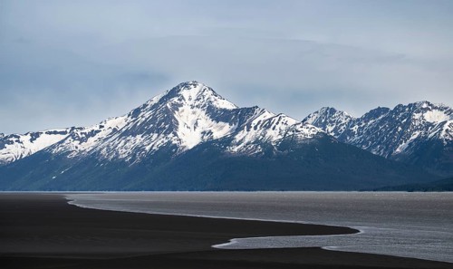 View of the Turnagain Arm estuary at low tide to the mountains of the Kenai Peninsula, Anchorage,