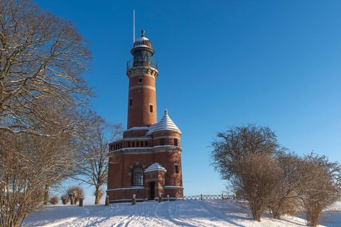 Holtenau lighthouse at the entrance of the Kiel Canal in winter, west bank of the Kiel Fjord,
