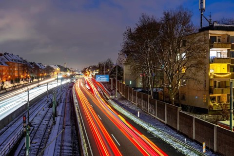 Autobahn A40, Ruhrschnellweg, near Essen at the Frohnhausen junction, evening traffic in winter,