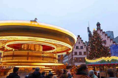December 22, 2025, Frankfurt Christmas Market on Roemerberg with the skyline in the background at