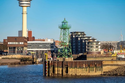 Skyline of Bremerhaven, seen across the Weser, lighthouse at the mouth of the Geeste, harbour of
