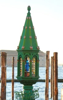 Lamp with portrait of Mary at a gondola station, Venice, Veneto, Italy
