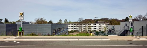 School bus stop, Hauptschule Mathilde - Anneke - school, houses, modern buildings, apartment