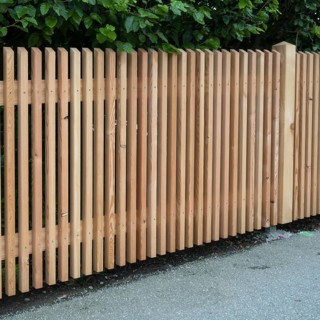 Wooden fence on the side of the road, vertical slats, town of Tegernsee, Upper Bavaria, Bavaria,