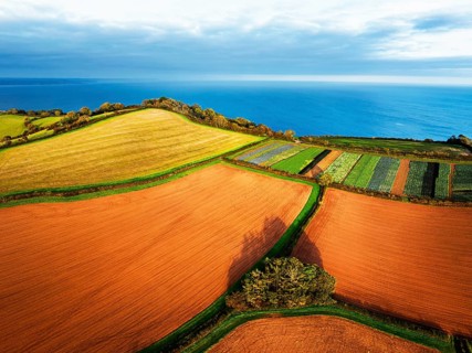 Colours of autumn Fields and Farms over Sheldon from a drone, Torbay, Devon, England, United