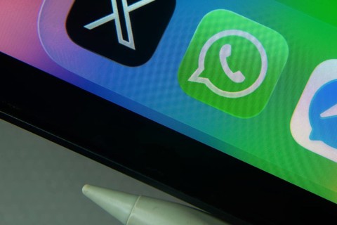 16 Nov 2025- Dhaka, Bangladesh: WhatsApp and other app icons with a digital pen on a iPad screen