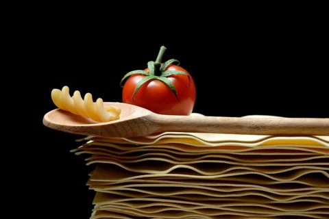 Lasagna, lasagna leaves and cooking spoon with fusilli noodle, noodle nest pasta type