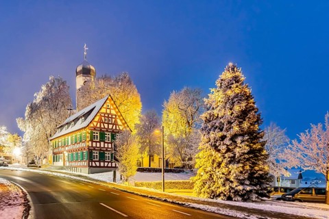 St. Stephen's Church Westerheim in winter with Christmas tree. hoarfrost. Westerheim, Alb-Danube
