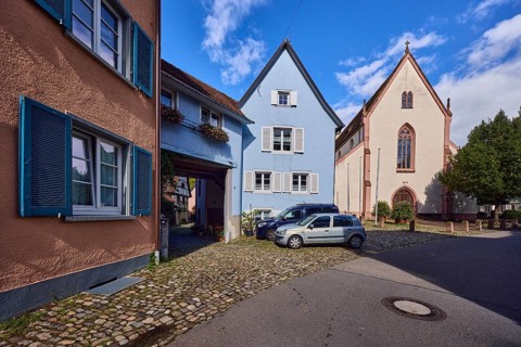 St. Martin parish church, houses, historic residential buildings, multi-family houses, road, curve,