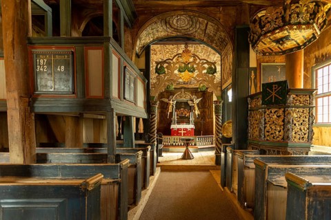 Interior with a view of the altar in Lom Stave Church (Lom stavkyrkje), Lom, Norway
