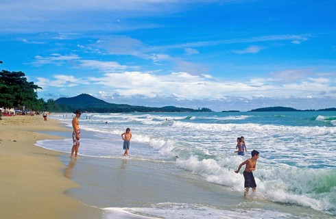 People, children, sea, surf, Chaweng Beach on Ko Samui, Thailand, December 2002, vintage, retro,