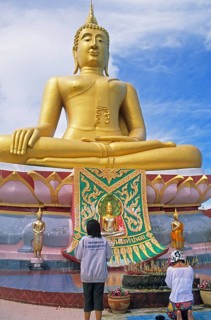 People praying, Big Buddha statue on the island of Ko Samui, Thailand, December 2002, vintage,