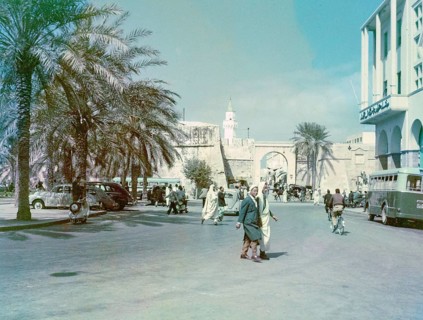 Street scene with view to Bab al-Khendig archway city gate, Tripoli, Libya, North Africa 1956