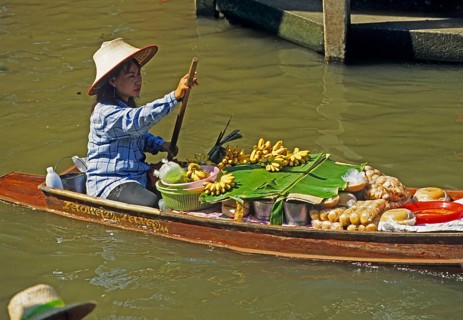Merchant in her boat at Damnoen Saduak Floating Market, Thailand, December 2002, vintage, retro,