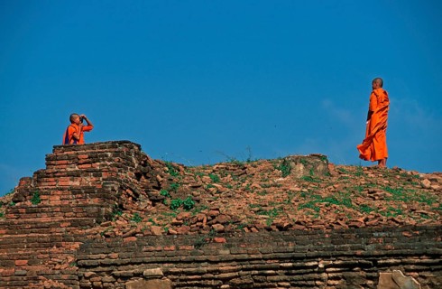 Monk takes photo of monk at Wat Phra Si Sanphet, Ayutthaya, Thailand, December 2002, vintage,