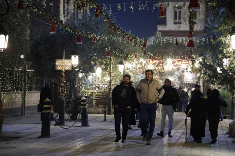 In Damascus, Syria, on December 25, 2025, festive scenes filled the streets and churches of the Bab