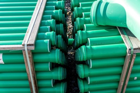 Symbolic picture construction site, sewage pipes for dirty and rainwater, for installation in the
