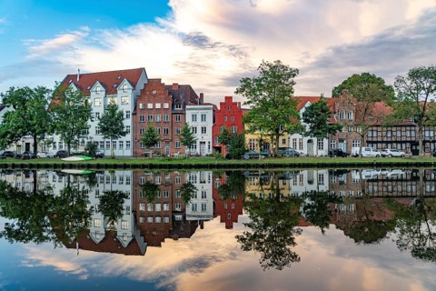 Lübeck's old town and the river Trave at dusk, Lübeck, Schleswig-Holstein, Germany