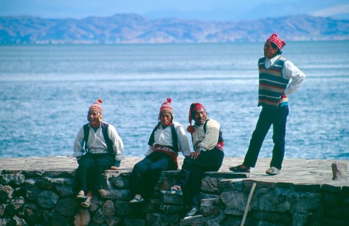 Men wearing traditional clothing on Isla Taquile in Lake Titicaca, Andean Highlands, Peru, South