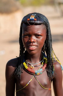 Portrait, brightly decorated girl of the Hakaona tribe, also Havakona or Hakawona, near Opuwo,