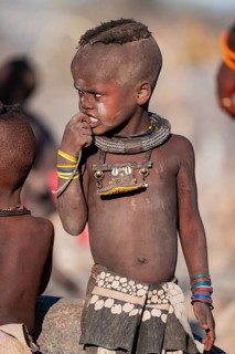 Portrait, young Himba child, traditional Himba village, Kaokoveld, Kunene, Namibia
