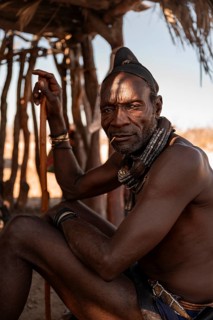 Elderly man, leader of the Himba, traditional Himba village, Kaokoveld, Kunene, Namibia