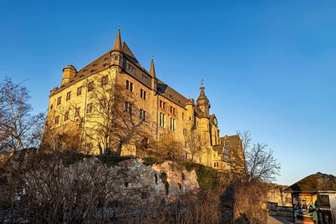 Majestic castle in Marburg in the warm light of the evening sun and a clear sky, The Landgrave