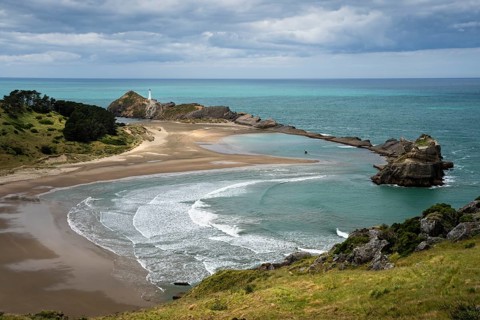 Deliverance Cove and Castlepoint Lighthouse, Castle Rock views, rocks, ocean. Castlepoint,