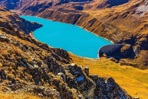 The dam and turquoise lake Lac de Moiry, Val d'Anniviers, Valais Alps, Canton of Valais,
