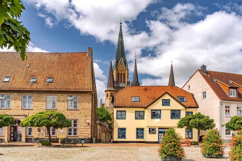 The Town Hall Market in Schleswig's Old Town and St. Peter Cathedral, City of Schleswig,