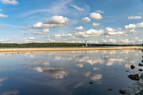 Falkensteiner Beach and Friedrichsort lighthouse on the Kiel Fjord, Kiel, Schleswig-Holstein,