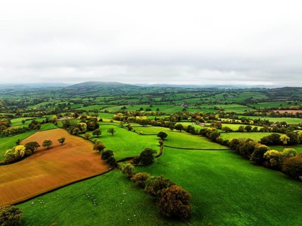 Autumn colours over Wales Farms and Fields from a drone, Grosmont, Abergavenny, Monmouthshire,
