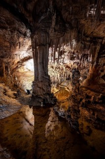 Stalactites and stalagmites, water basins and rock formations in a stalactite cave, Grotta del