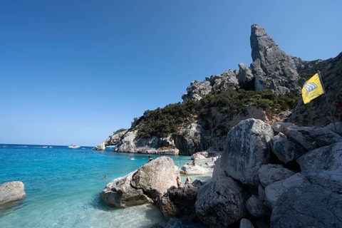 Light blue clear sea on a dream beach on Cala Goloritzé, picturesque rocky coast, steep coast with